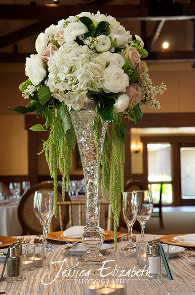 This lovely White Pink and Green Centerpiece was created by HollyHill
